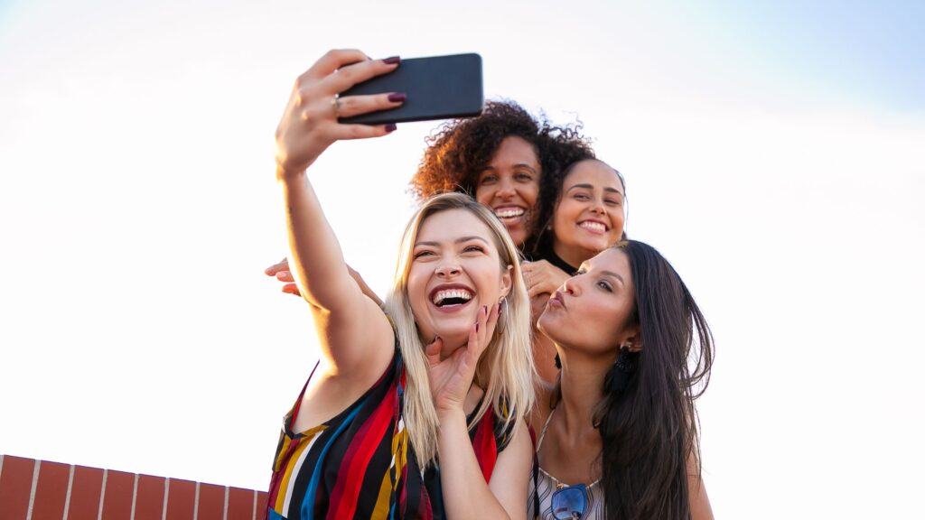 women posing together for selfie