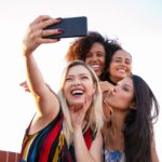 women posing together for selfie