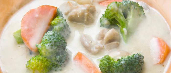 creamy stew with broccoli, carrots, and chicken